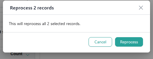 Reprocess 2 records confirmation dialog with Cancel and Reprocess buttons